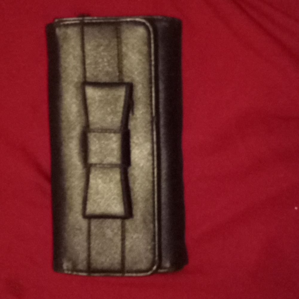 Black wallet with bow on front